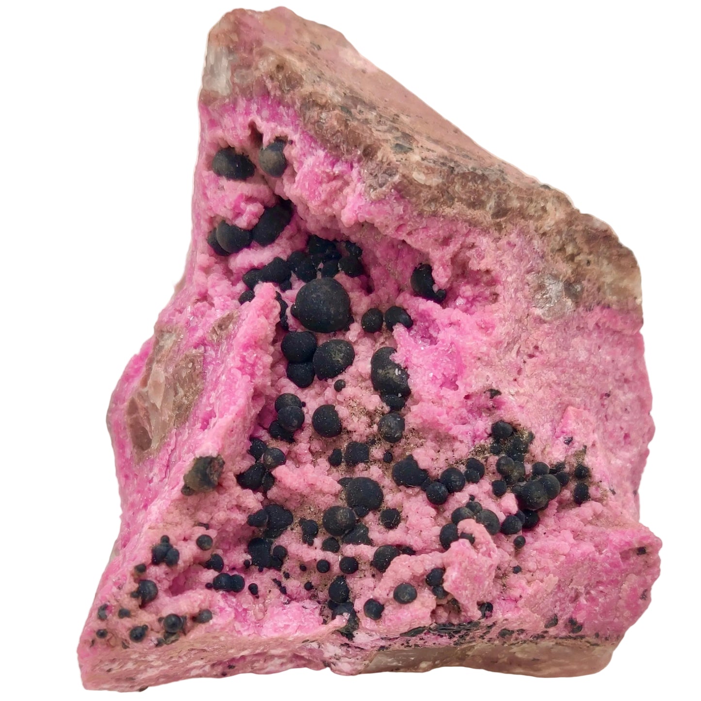 Pink crystal with black inclusions on a white background