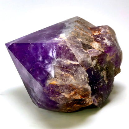 Amethyst crystal on a white background