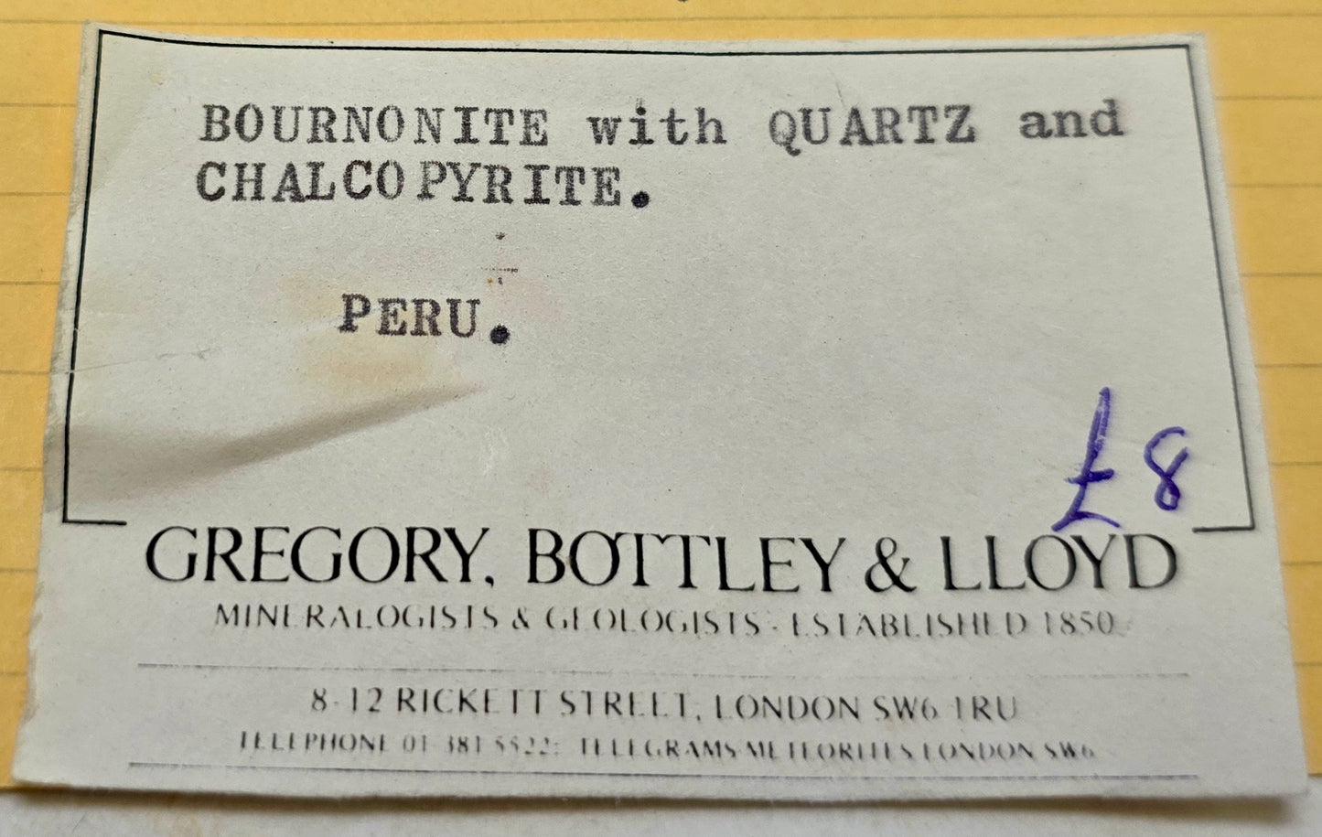 Vintage label for Bournonite with Quartz and Chalcopyrite from Peru, featuring Gregory, Bottley & Lloyd.
