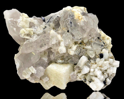 Mineral sample with crystal formations on a black background