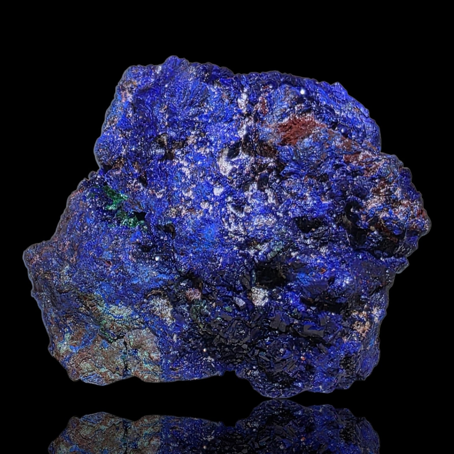 Blue mineral rock on a black background