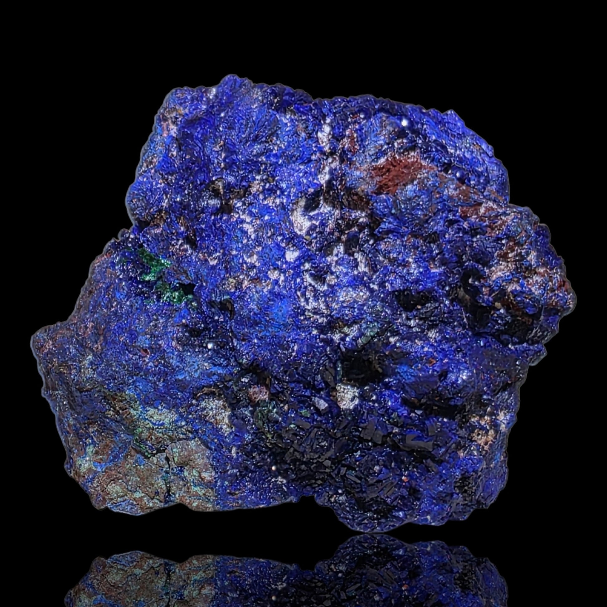Blue mineral rock on a black background