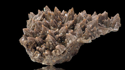 Mineral specimen with crystal formations on a black background