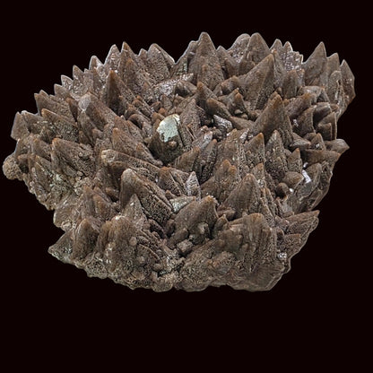 Mineral specimen with spiky crystal structure on a black background