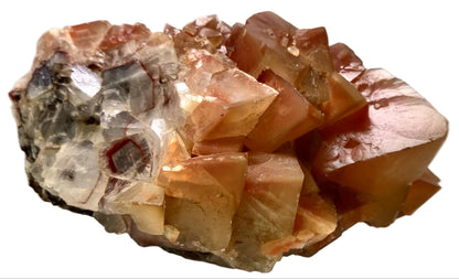 Mineral specimen on a white surface with a neutral background