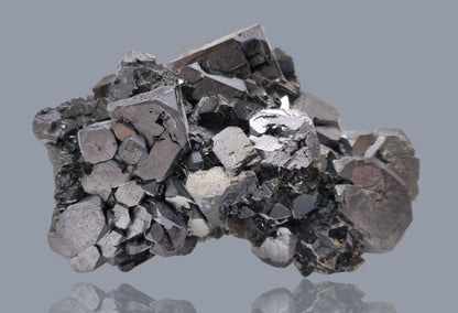 Close-up of metallic Galena crystal cluster with jet-black octahedral Sphalerite and golden Chalcopyrite from the Madan Ore Field, Bulgaria.