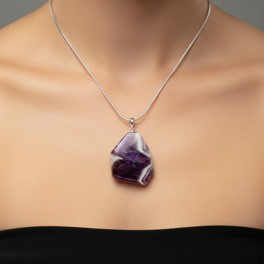 Necklace with a purple pendant on a mannequin
