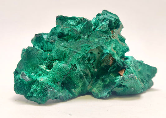 Green mineral rock on a white background