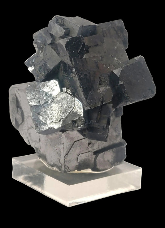 Mineral specimen with crystal-like structure on a white background