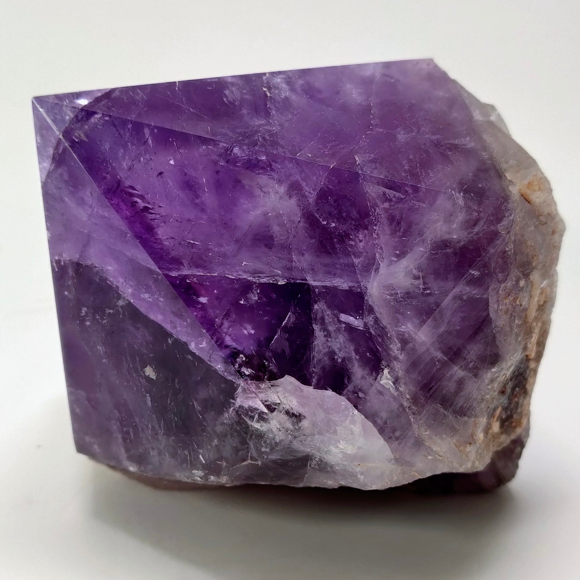 Purple crystal on a white background