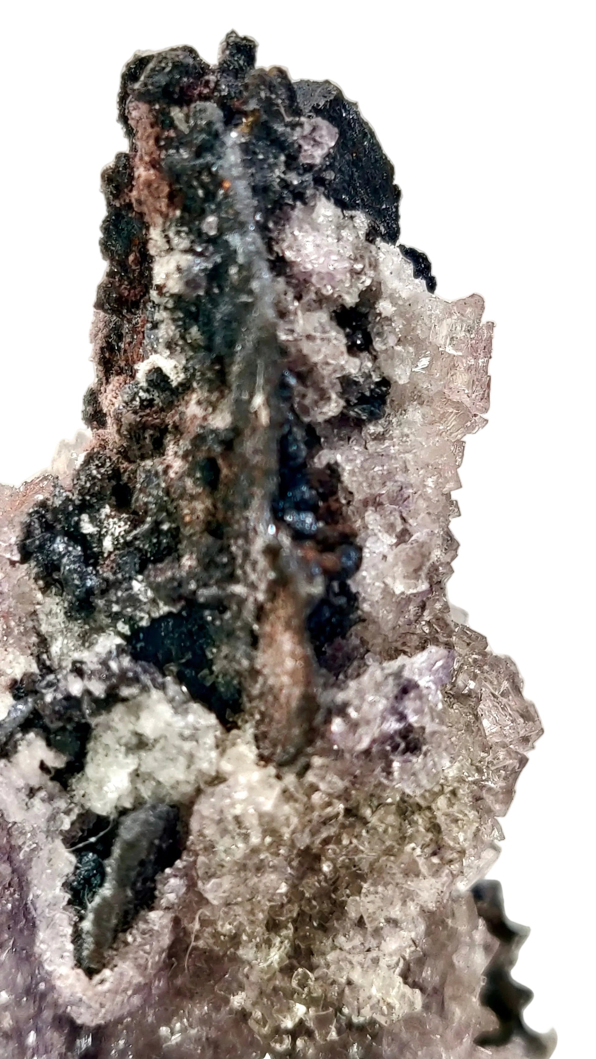 Mineral specimen with crystal formations on a white background