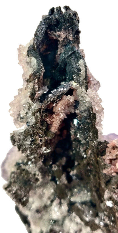 Mineral specimen with crystal structure on a light background