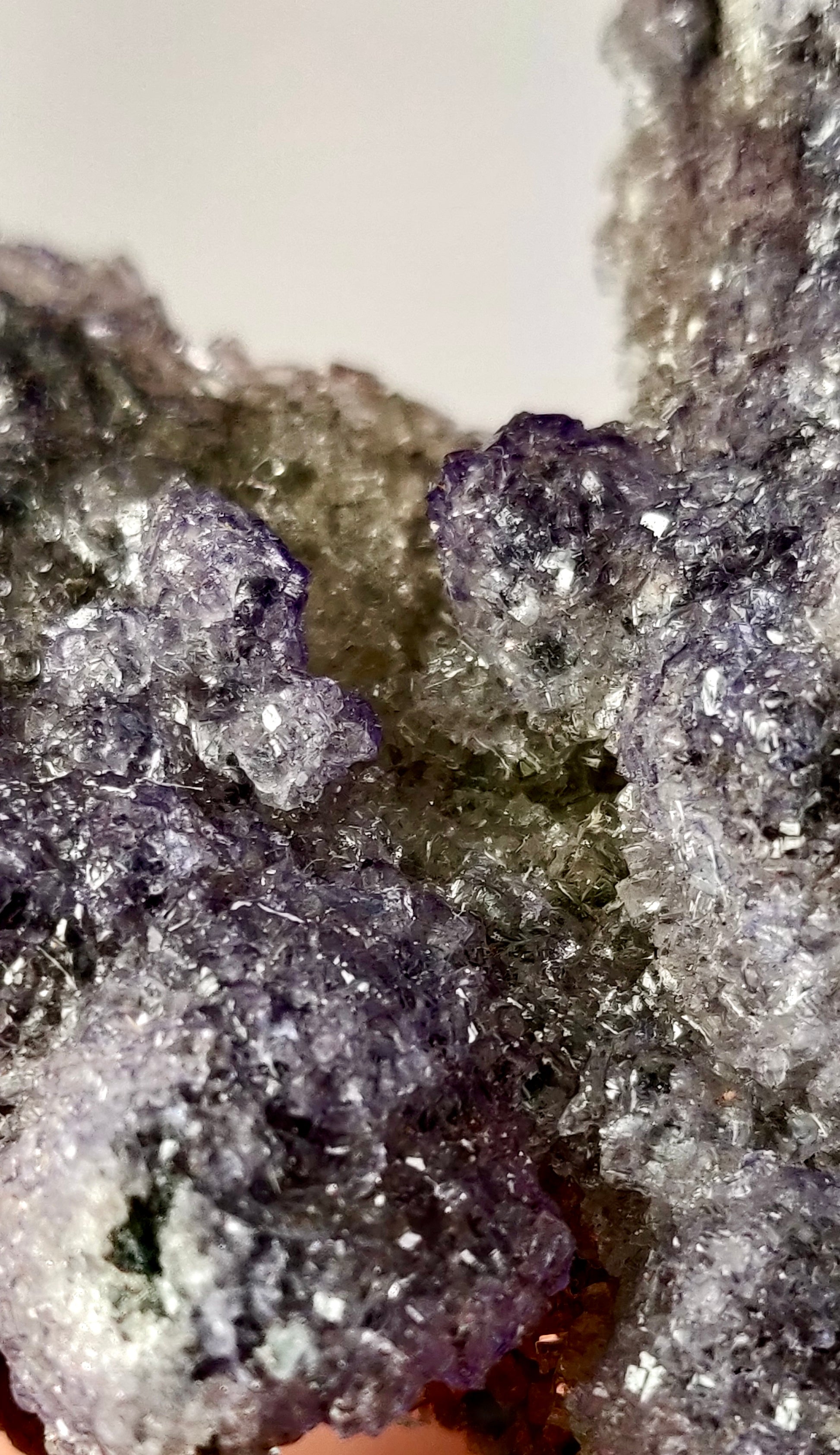 Close-up of a crystal formation with a white background