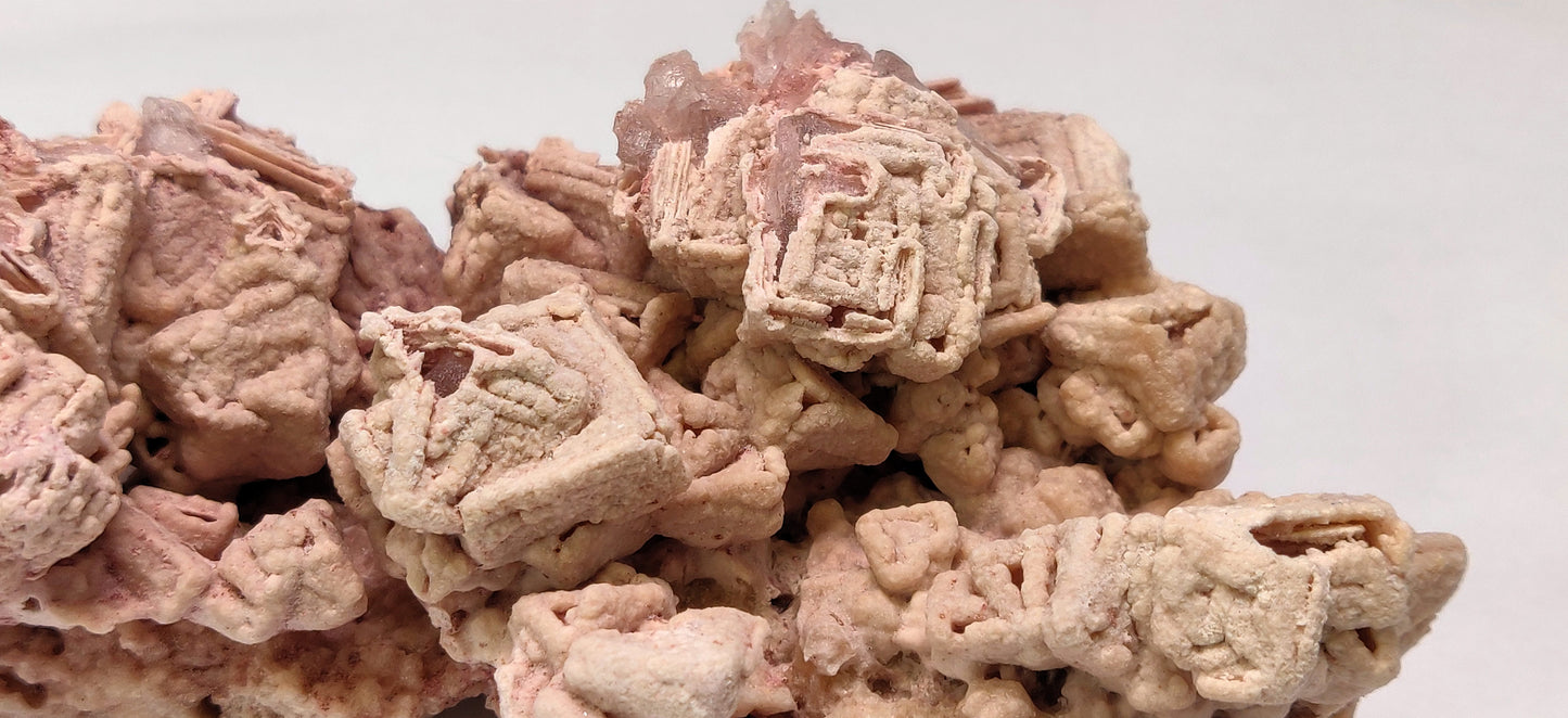 Large Pink Halite hopper crystal specimen from Searles Lake, California.