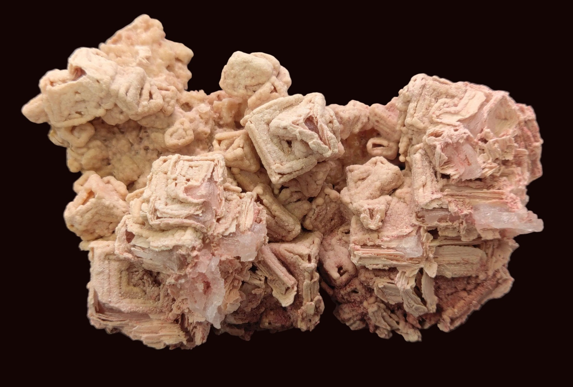 Large Pink Halite hopper crystal specimen from Searles Lake, California.