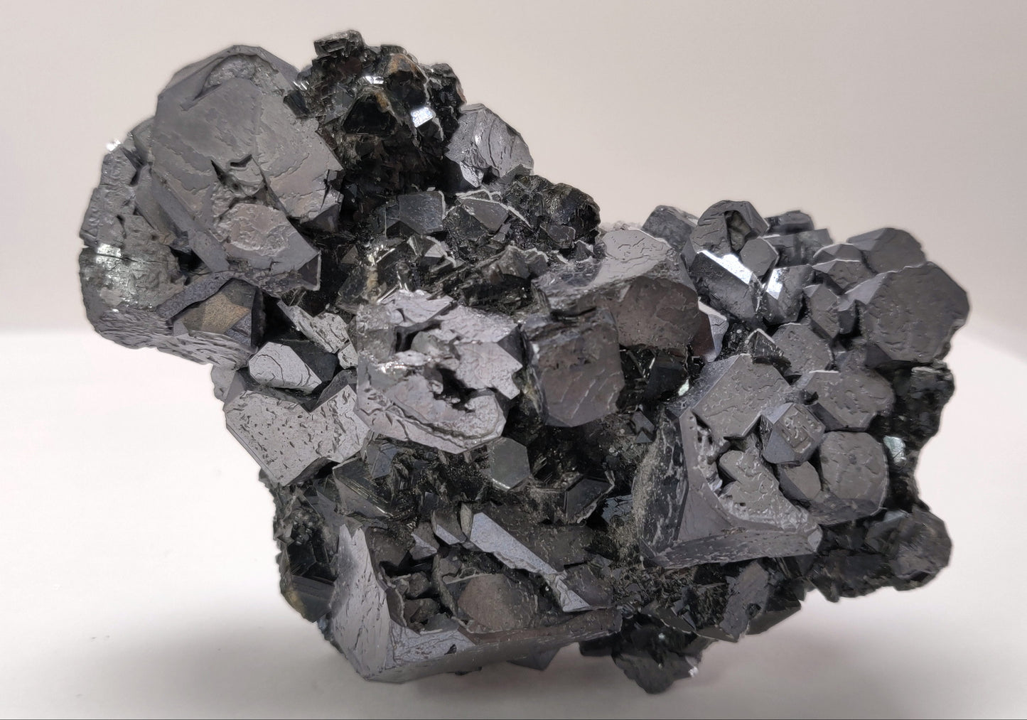 Close-up of metallic Galena crystal cluster with jet-black octahedral Sphalerite and golden Chalcopyrite from the Madan Ore Field, Bulgaria.
