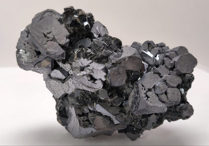 Close-up of metallic Galena crystal cluster with jet-black octahedral Sphalerite and golden Chalcopyrite from the Madan Ore Field, Bulgaria.
