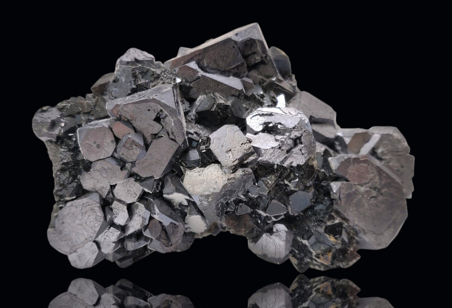 Close-up of metallic Galena crystal cluster with jet-black octahedral Sphalerite and golden Chalcopyrite from the Madan Ore Field, Bulgaria.