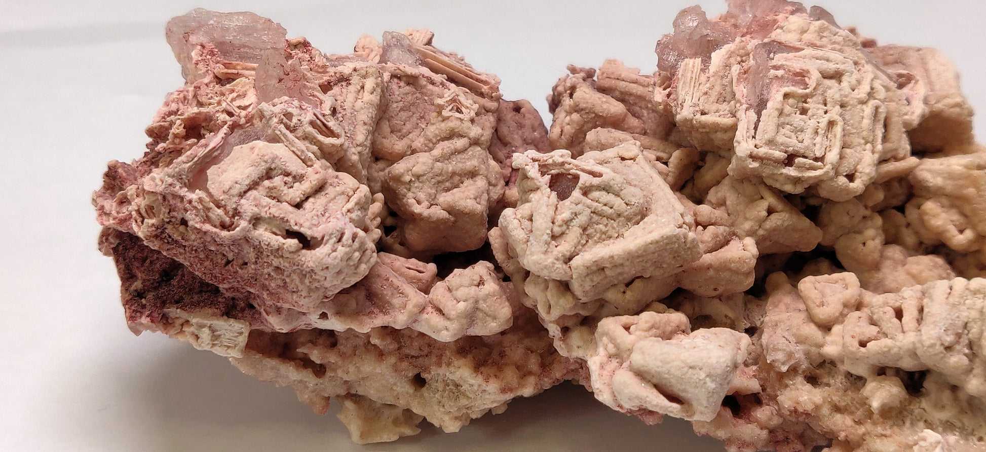 Large Pink Halite hopper crystal specimen from Searles Lake, California.