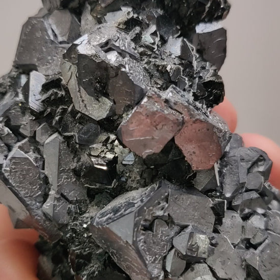 Close-up of metallic Galena crystal cluster with jet-black octahedral Sphalerite and golden Chalcopyrite from the Madan Ore Field, Bulgaria.
