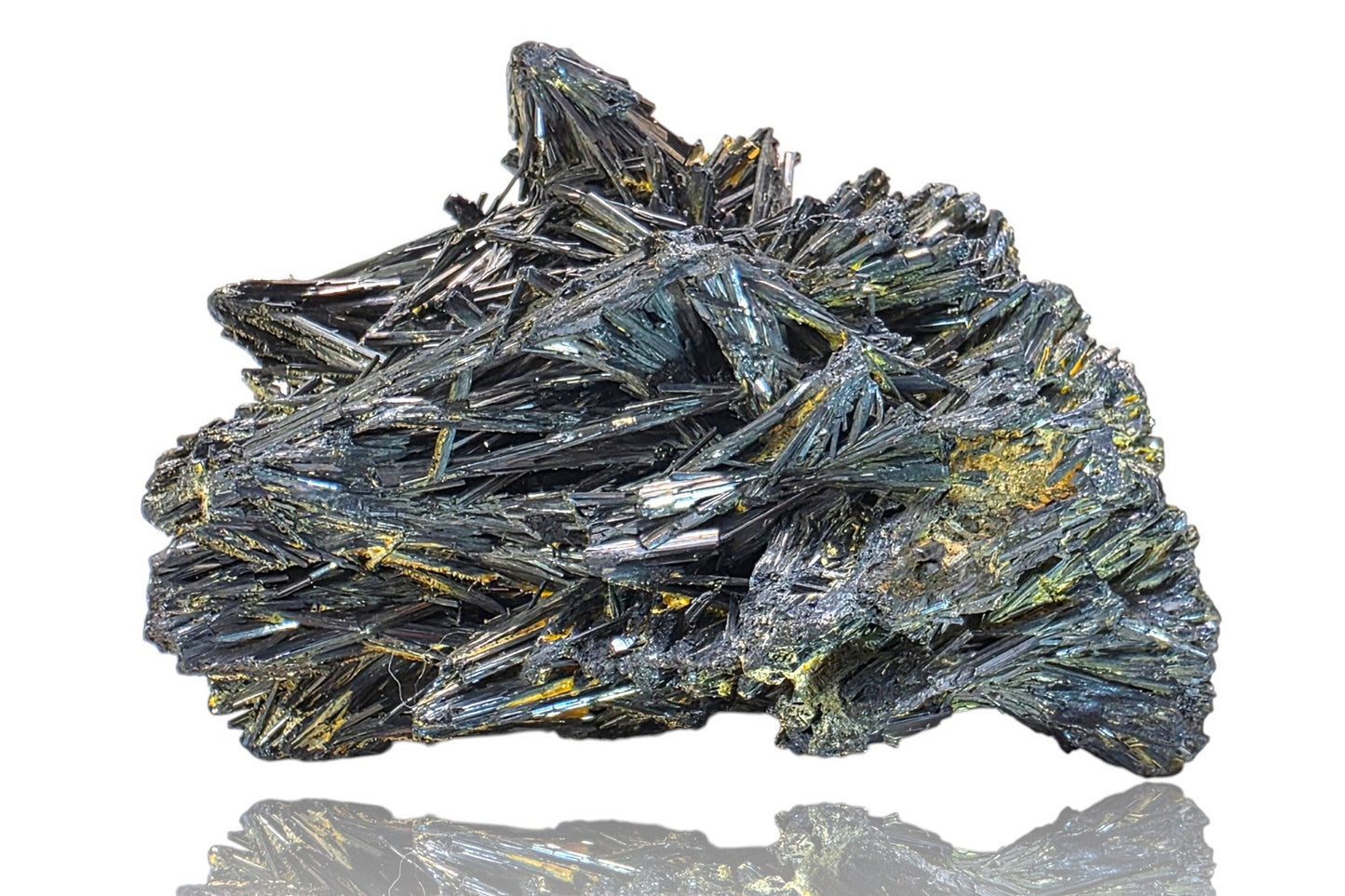 Mineral specimen with crystal formations on a white background
