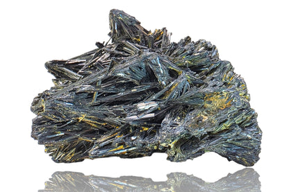 Mineral specimen with crystal formations on a white background
