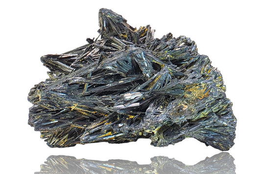 Mineral specimen with crystal formations on a white background